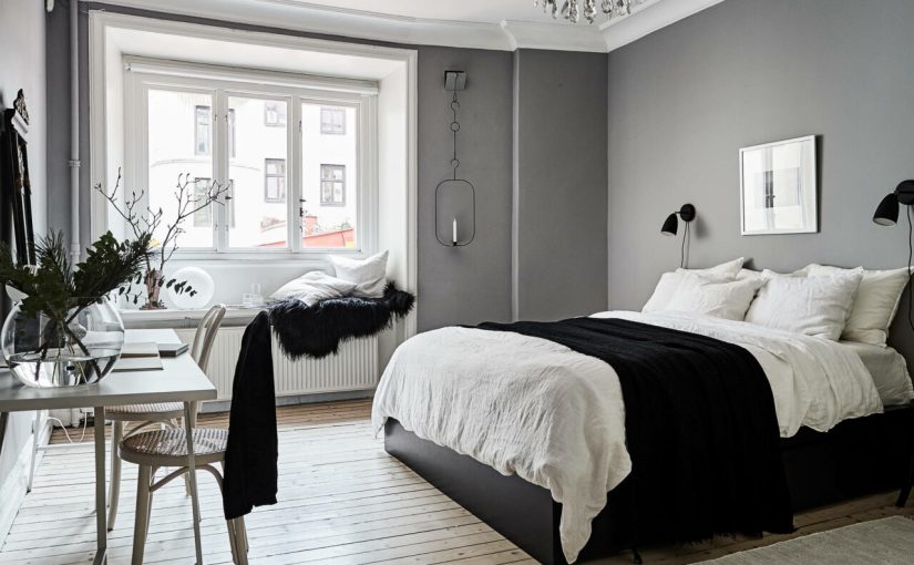 dormitorio color gris con detalles negros